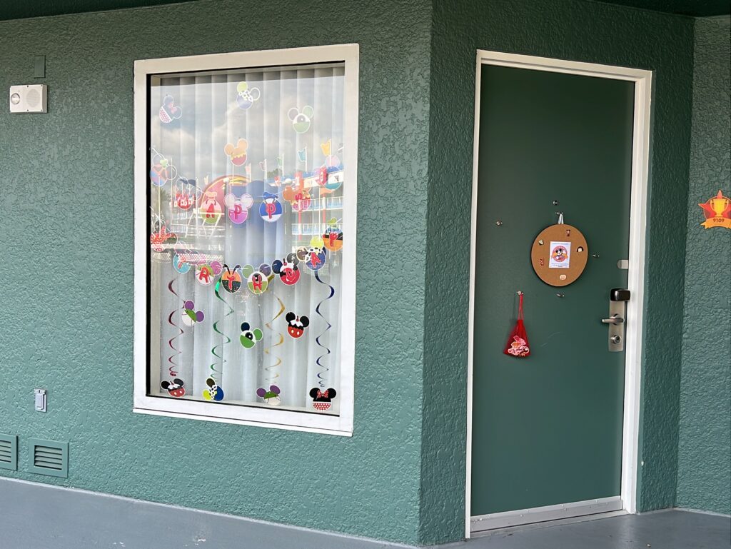 Disney World decorated window and pin trading at Disney's All-Star Sports Resort